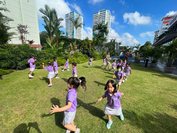 Children playing games in an open field