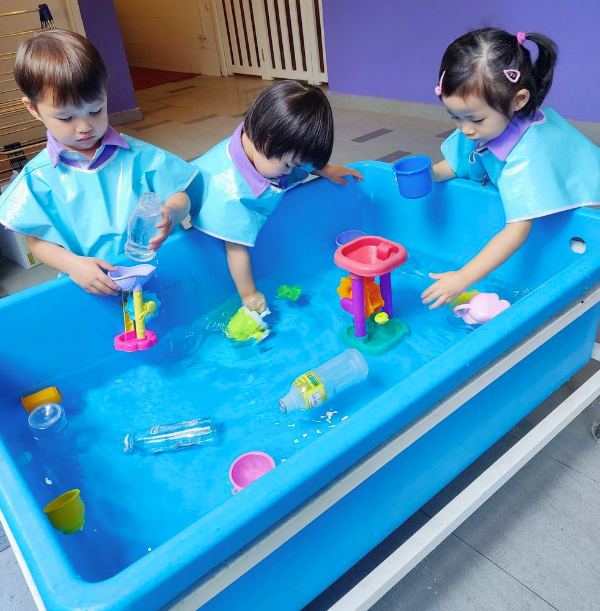 Children engaged in water play